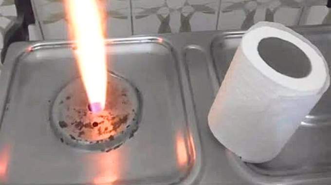 Illustration montrant le nettoyage des brûleurs d'une gazinière